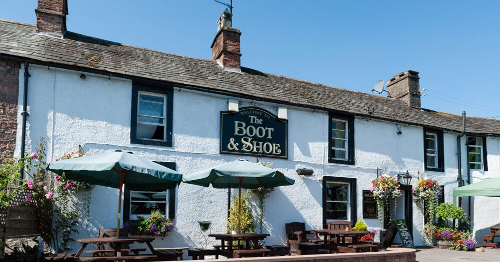 The front of the Boot and Shoe Inn, which is predominantly white in colour.